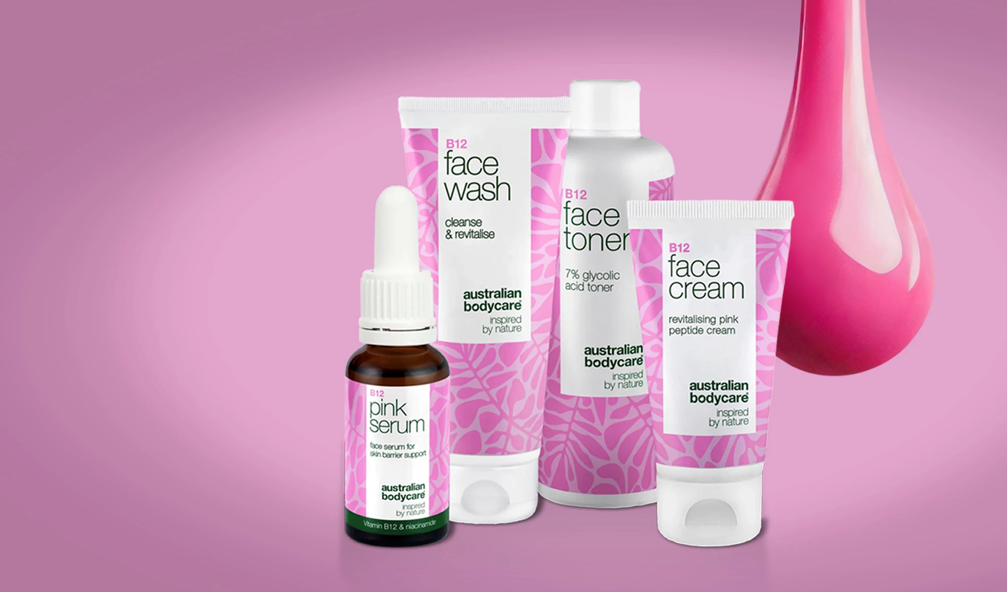 Fyra produkter från Australian Bodycare vid en stor rosa droppe, mot en rosa bakgrund.