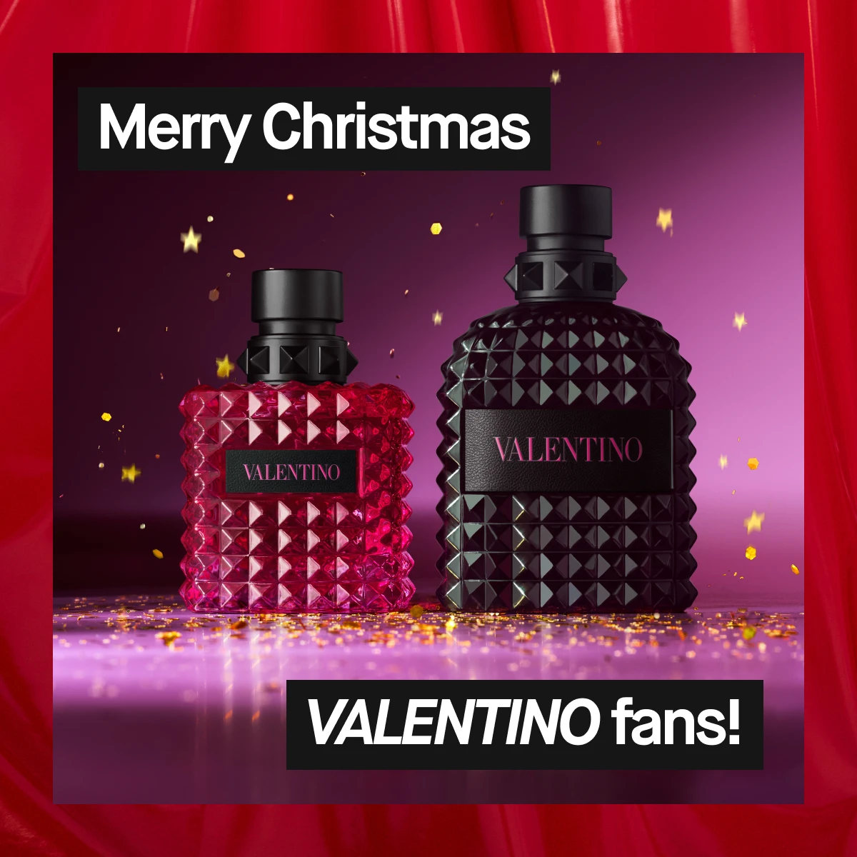 Bilde som viser to Valentino parfymer. Teksten "Merry Christmas, VALENTINO fans!" og "WOW!" er synlige. Bakgrunnen er rød med lilla detaljer.