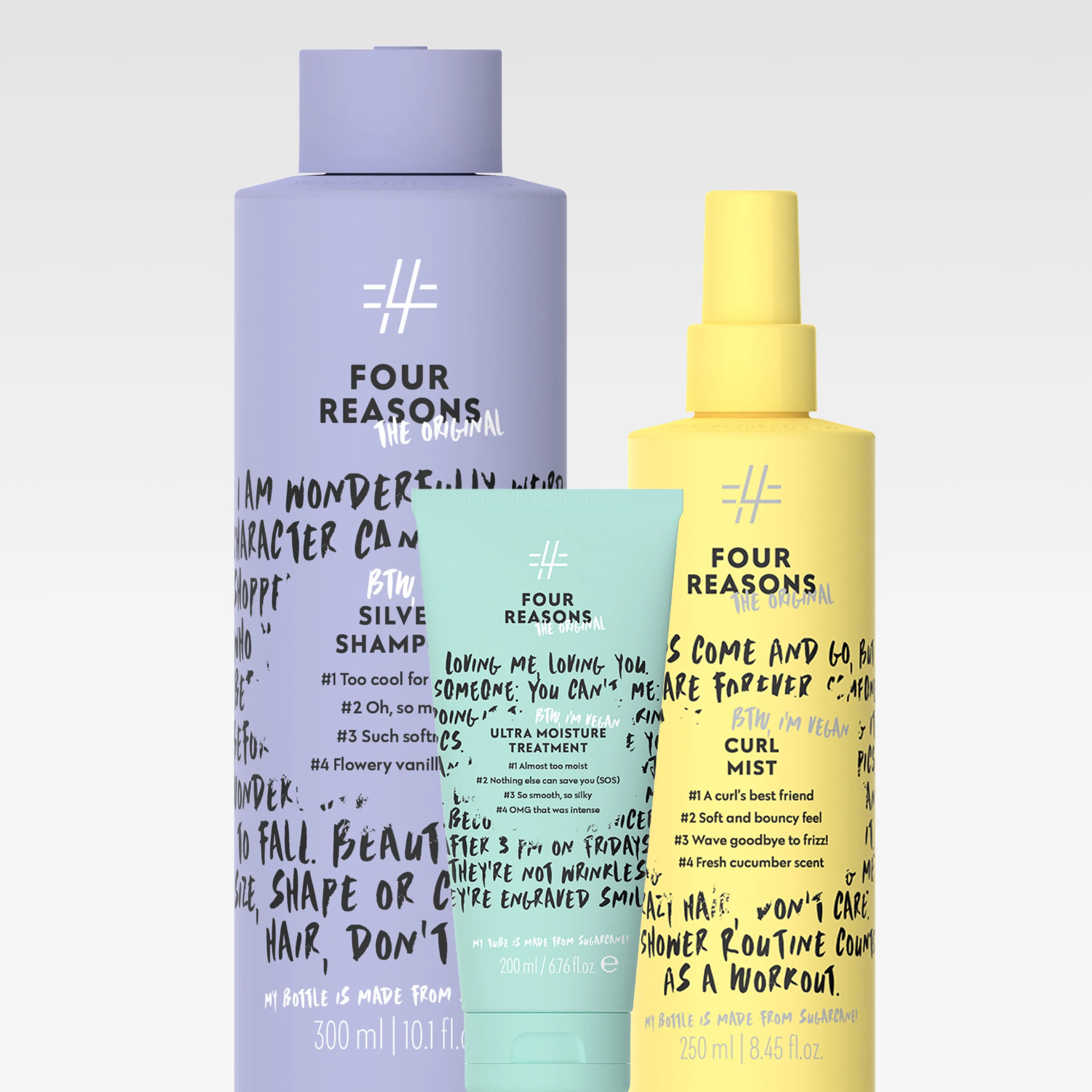 Tre hårvårdsprodukter från Four Reasons The Original: “Silver Shampoo”, “Ultra Moisture Treatment” och “Curl Mist”. På flaskorna syns även varumärket “FOUR REASONS THE ORIGINAL” samt produktnamnen på förpackningarna.
