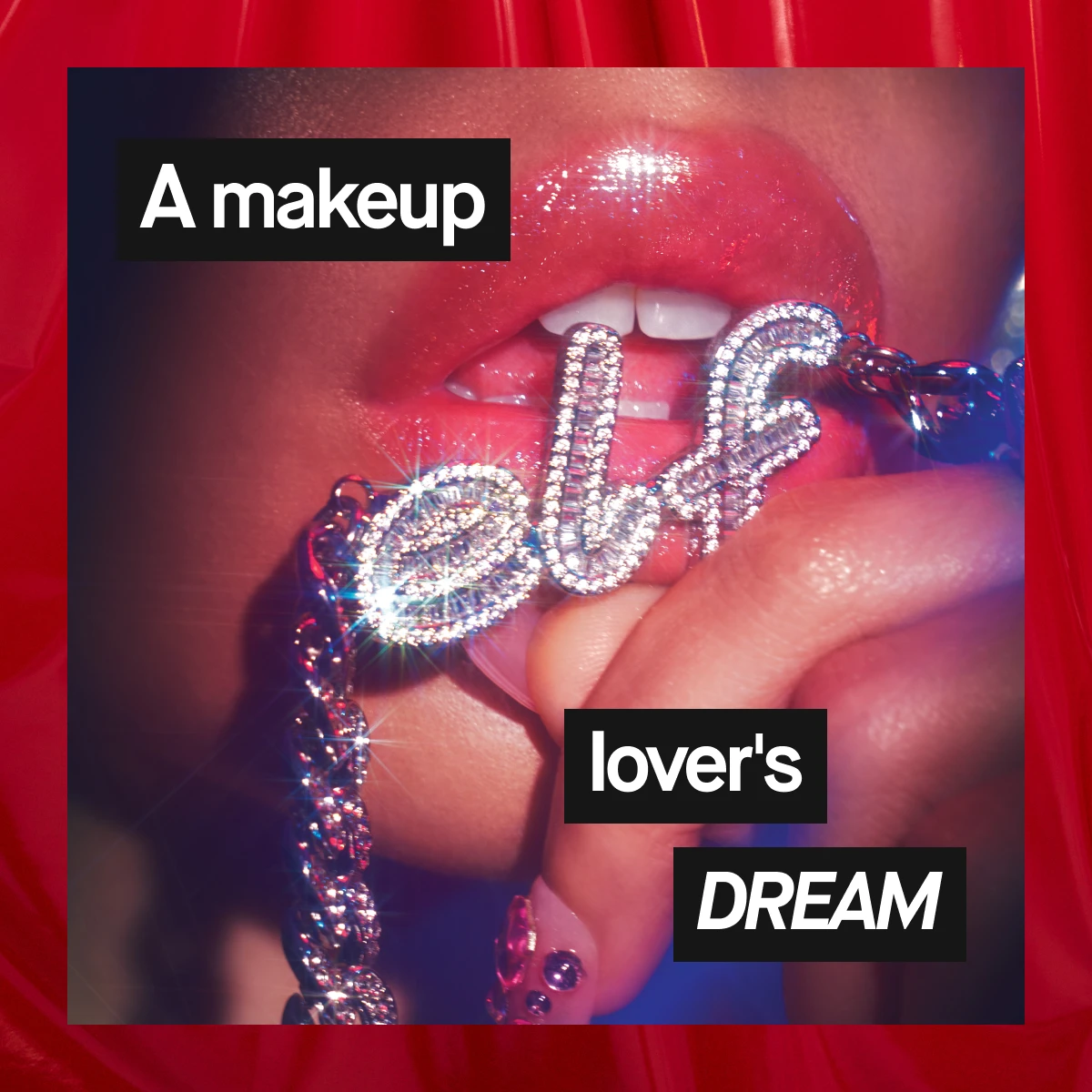 Nærbilde av glansfulle lepper som holder et glitrende smykke med e.l.f.-logo mot rød bakgrunn – en drømmende makeupkampanje med fokus på glød og glamour.