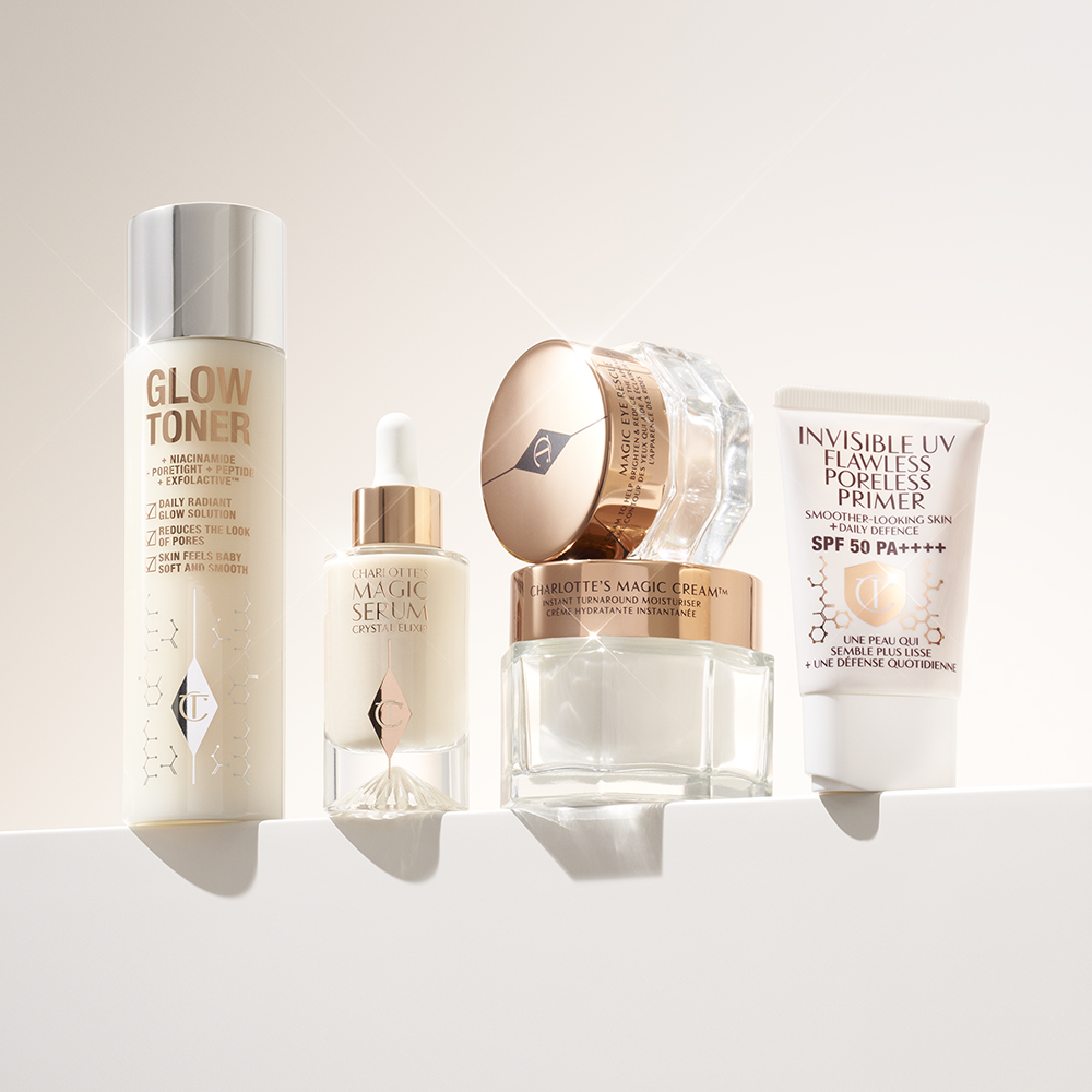 Charlotte Tilbury hudvårdsprodukter, inklusive toner, serum, fuktkräm och primer.