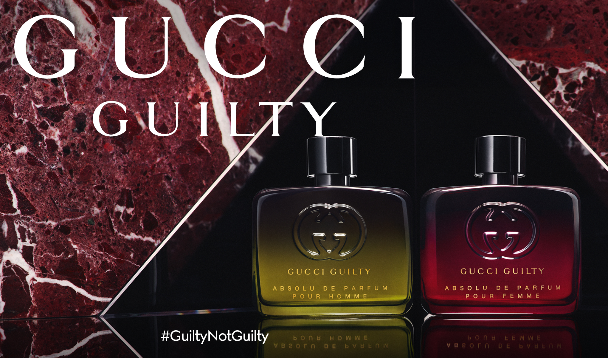 To Gucci Guilty Absolu de Parfum-duftflasker mot mørk bakgrunn, med teksten «Gucci Guilty» og «#GuiltyNotGuilty».