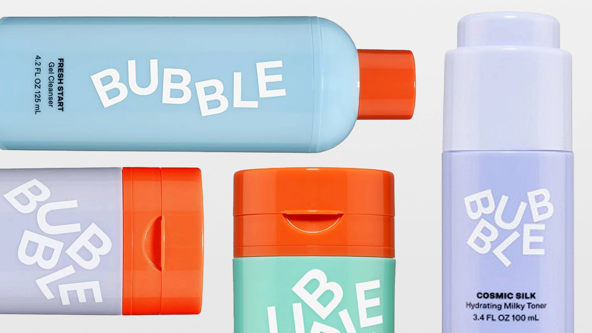 Flere hudpleieprodukter fra Bubble i pastellfarger plassert mot lys bakgrunn. Emballasje i blått, mintgrønt og lilla med oransje korker og hvit logotekst, inkludert en flaske merket “Cosmic Silk Hydrating Milky Toner 100 ml”.
