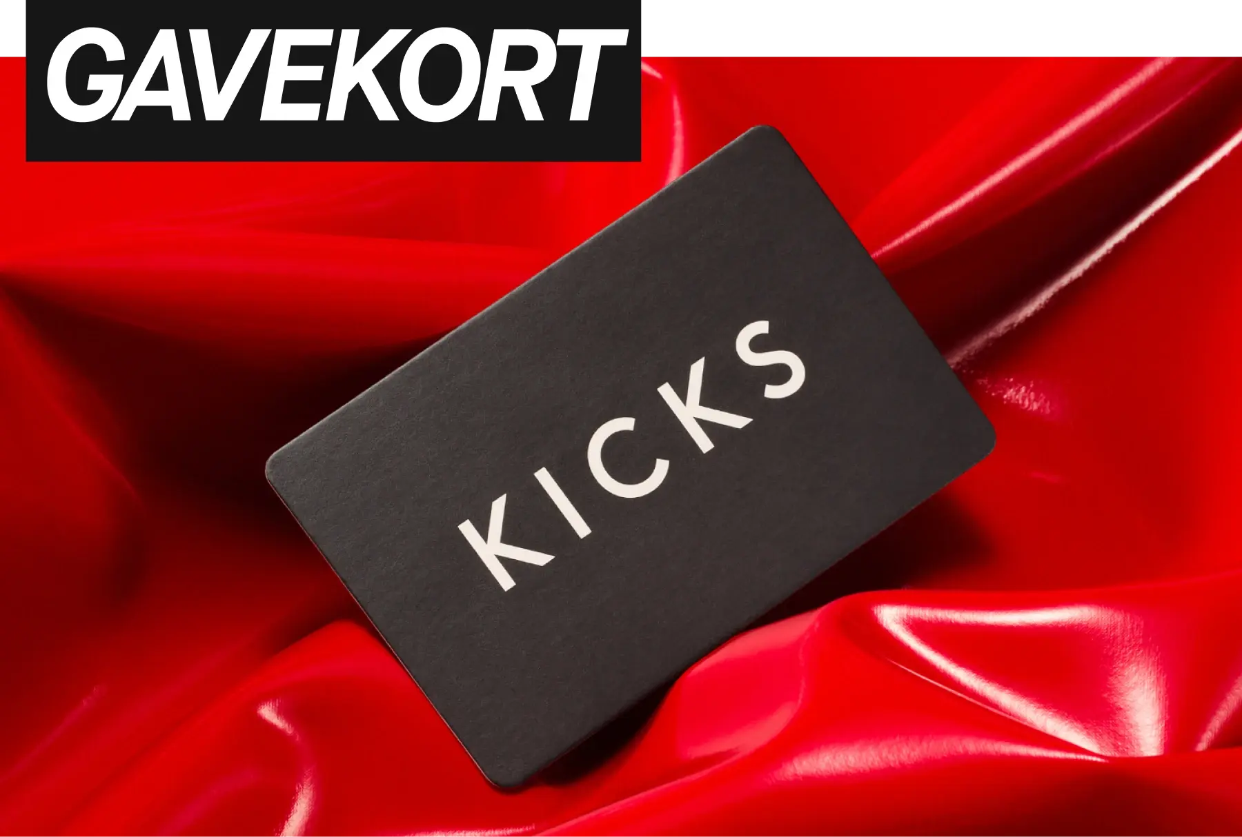 Sort gavekort fra KICKS med teksten "gavekort=zero stress"