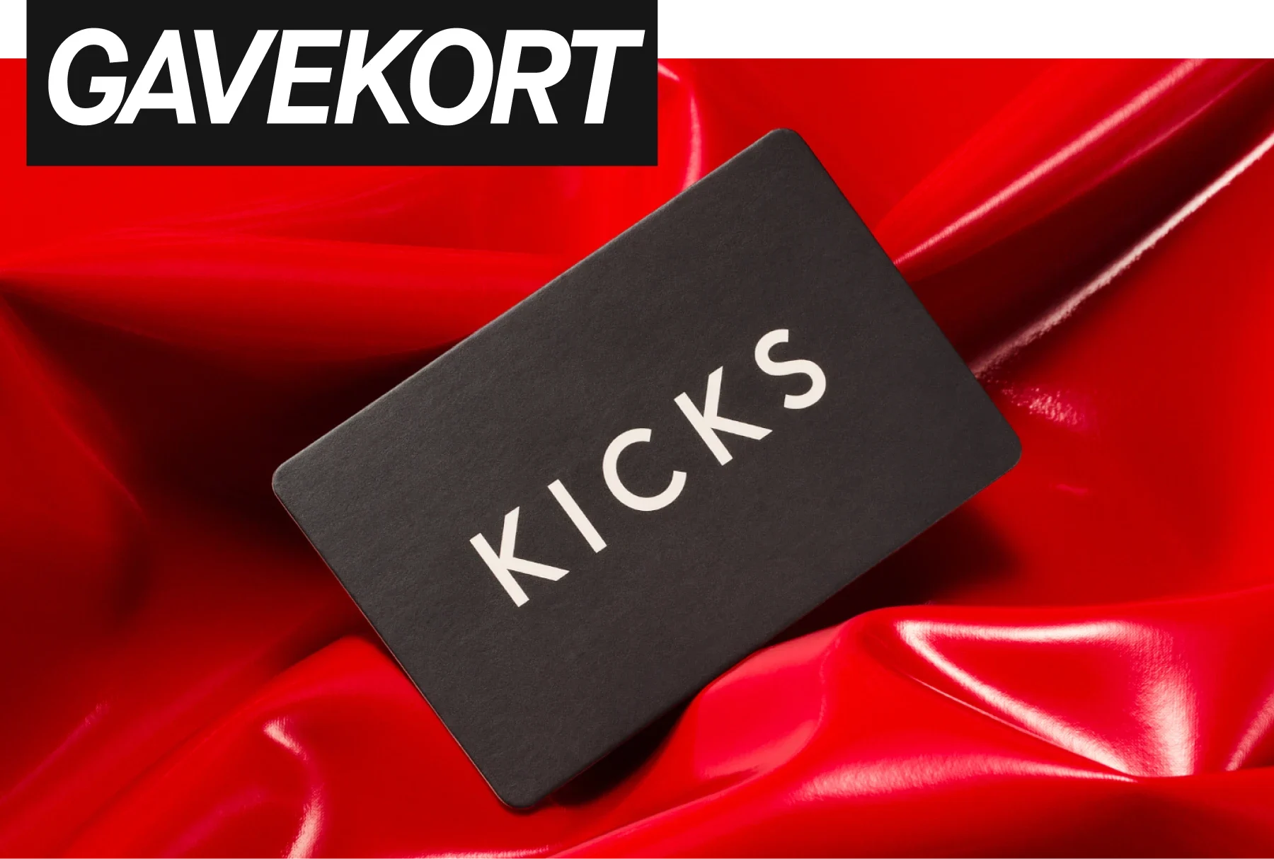 Sort gavekort fra KICKS med teksten "gavekort=zero stress"