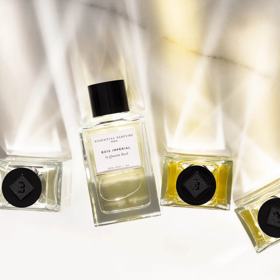 En bild på flera parfymflaskor från Essential Parfums, inklusive Bois Impérial av Quentin Bisch.