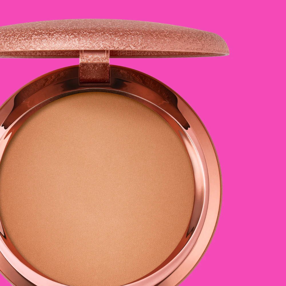 genväg till bronzer, rosa bakgrund och bild på en bronzer