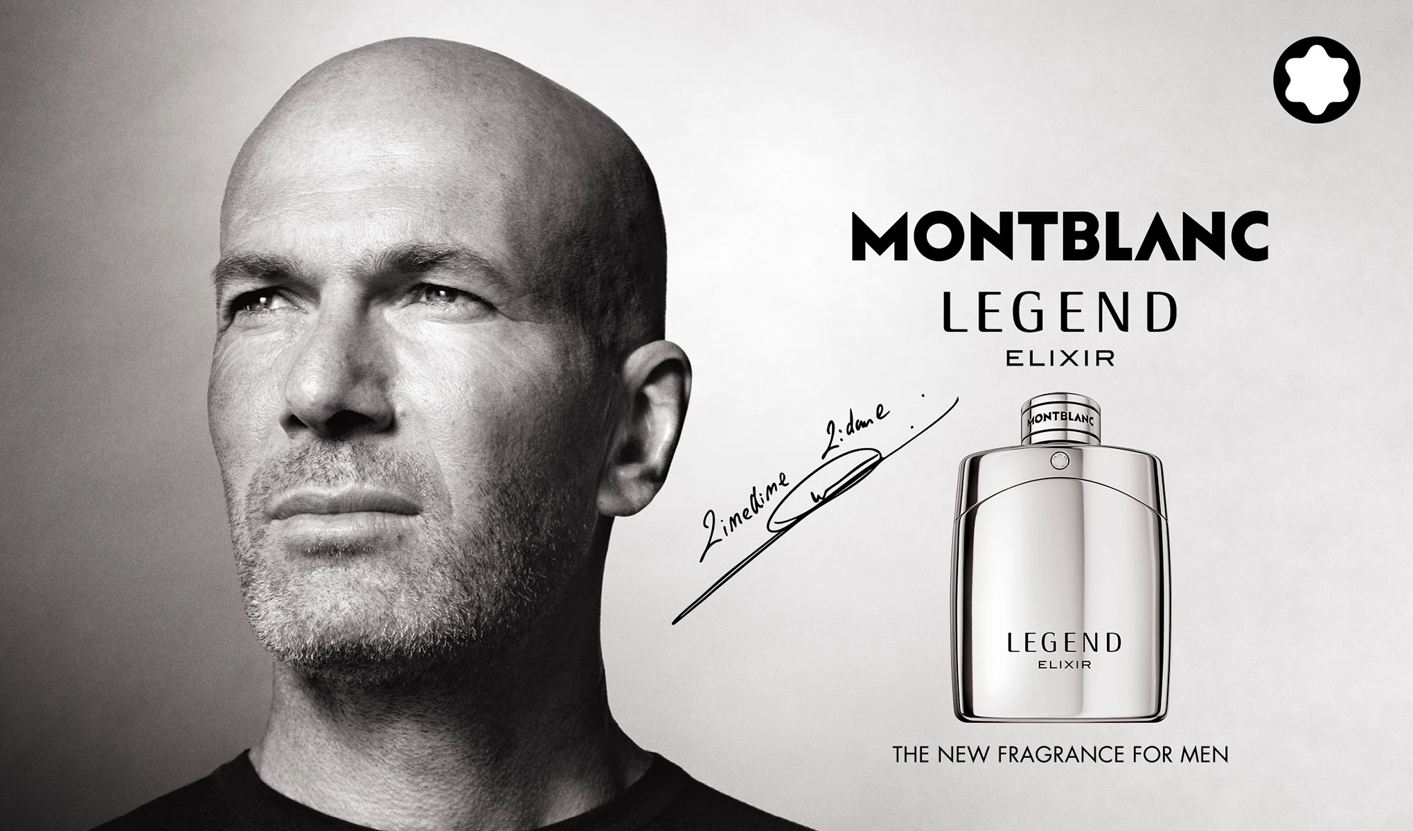 Montblanc-tuoksukokoelma useissa pulloissa, aseteltuna kukkien ja raaka-aineiden kanssa.