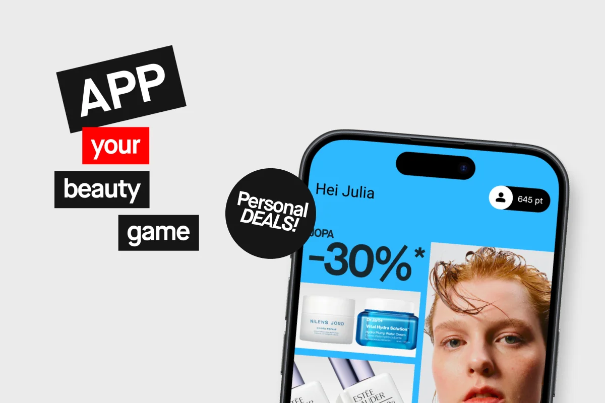 Puhelin, jonka näytölla näkyy KICKS-sovelluksen henkilökohtaisia tarjouksia ja Member Deals -etuja.