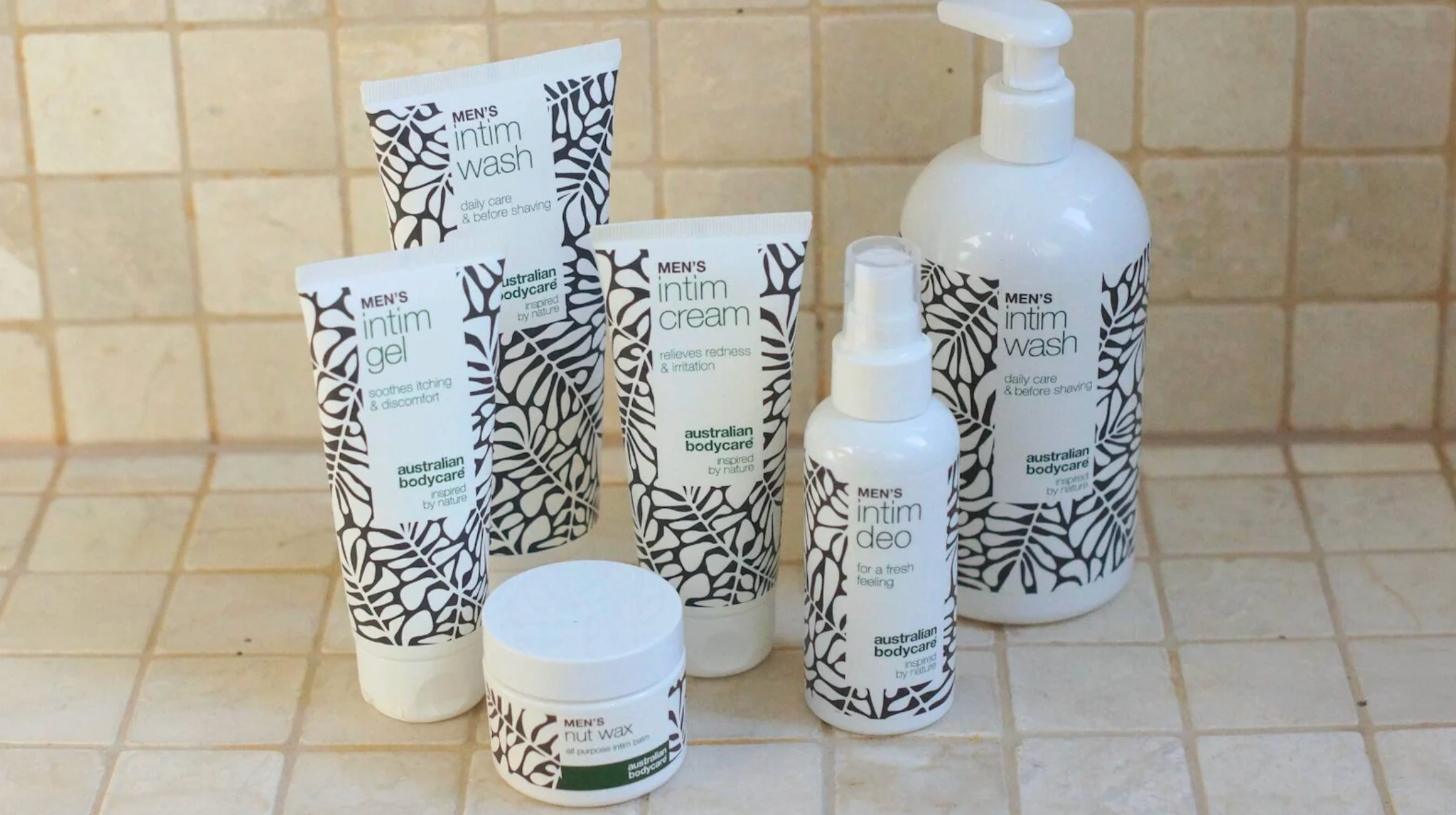 Et udvalg af Australian Bodycare Men's intime plejeprodukter, herunder intim wash, gel, creme, deo og nut wax.
