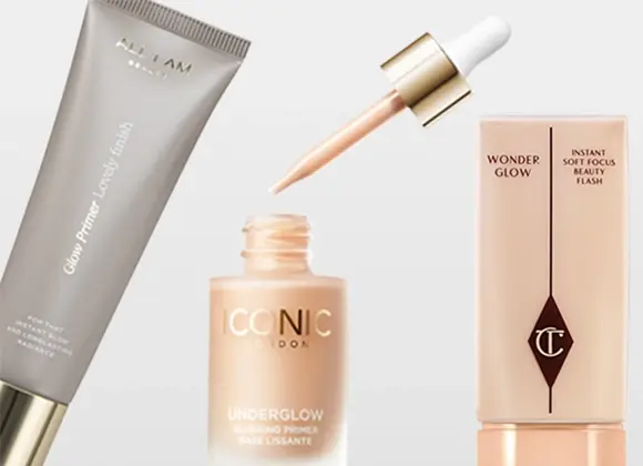 Kolme hehkua antavaa meikkituotetta vaaleaa taustaa vasten. Harmaa tuubi, jossa teksti “Glow Primer Liquid”, lasipullo pipetillä, jossa teksti “ICONIC London Underglow Blurring Primer”, sekä vaaleanpunainen pullo, jossa teksti “Wonder Glow Instant Soft Focus Beauty Flash”.
