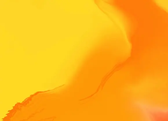 Abstrakti kuva lämpimillä keltaisen ja oranssin sävyillä.