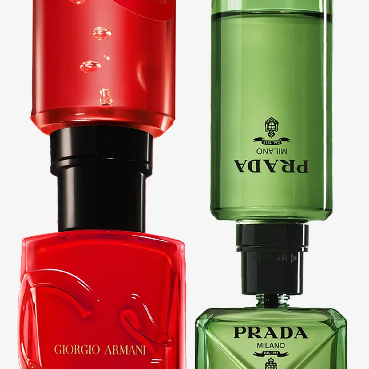 Eloisan punainen Giorgio Armani -hajuvesipullo vierekkäin kirkkaan vihreän Prada-hajuvesipullon kanssa.