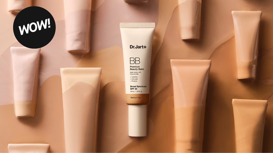 Dr.Jart+ Premium Beauty Balm BB-krem omgitt av ulike hudtoner. Tekst: «WOW!»