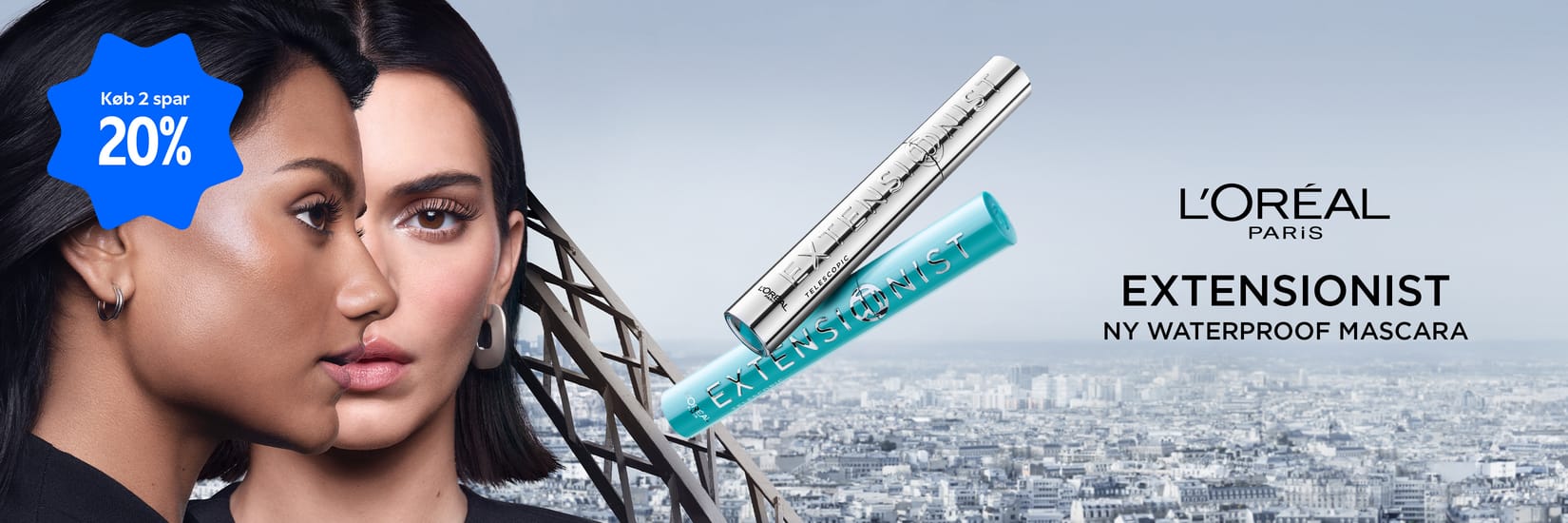 Her ses et billede af to personer foran en byudsigt med Eiffeltårnet i baggrunden. I midten ses mascaraen “EXTENSIONIST”, og til højre står teksten “L'ORÉAL PARIS EXTENSIONIST NY WATERPROOF MASCARA”. Et blåt mærke viser teksten “Køb 2 spar 20%”.