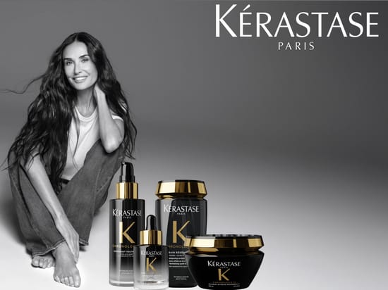 Sort-hvidt kampagnebillede med en kvinde med langt mørkt hår og Kérastase Chronologiste-produkter i sort og guld. Tekst: “Kérastase Paris – New Chronologiste”.